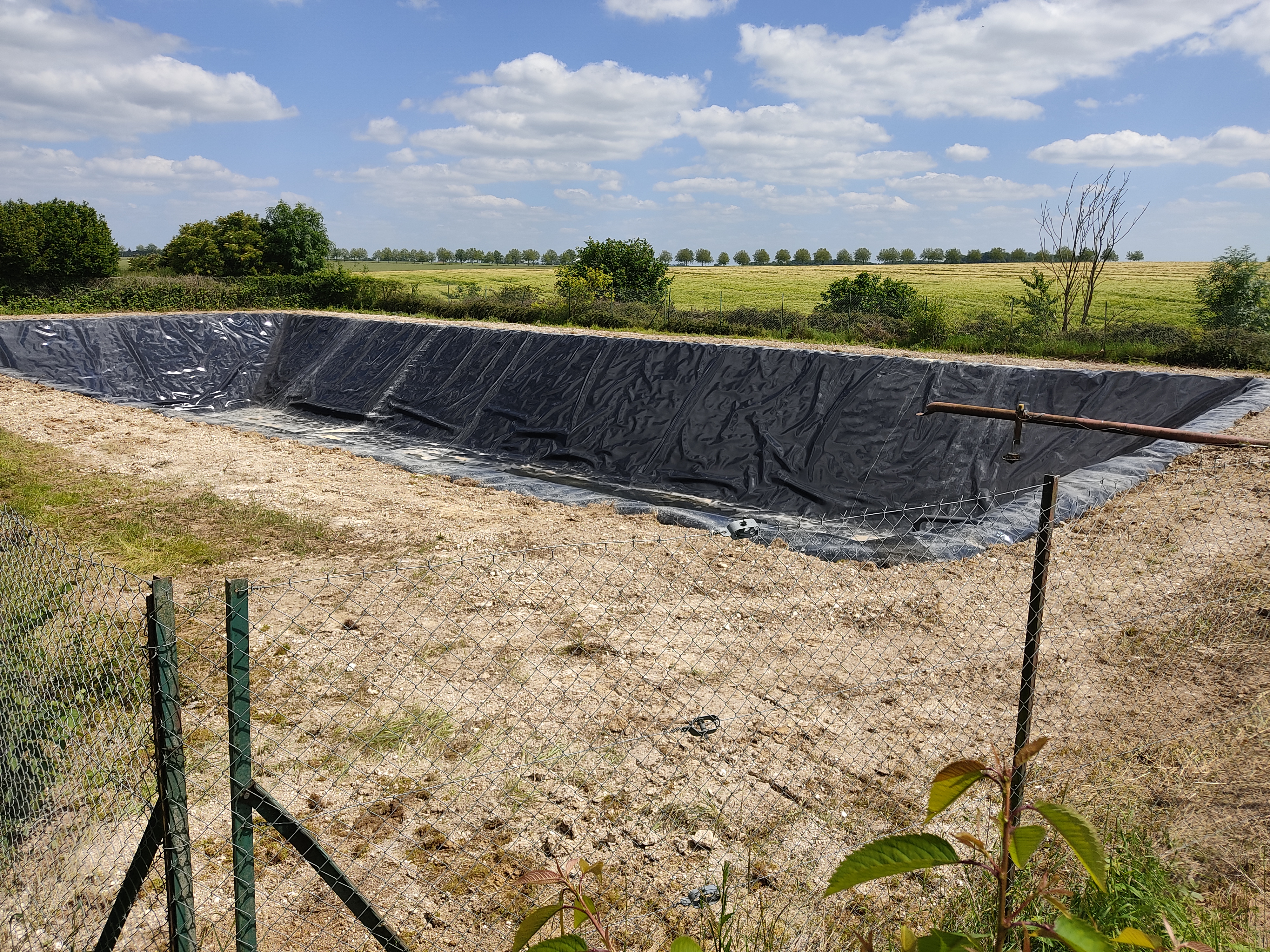 BASSIN TAMPON D'IRRIGATION. DPT 80