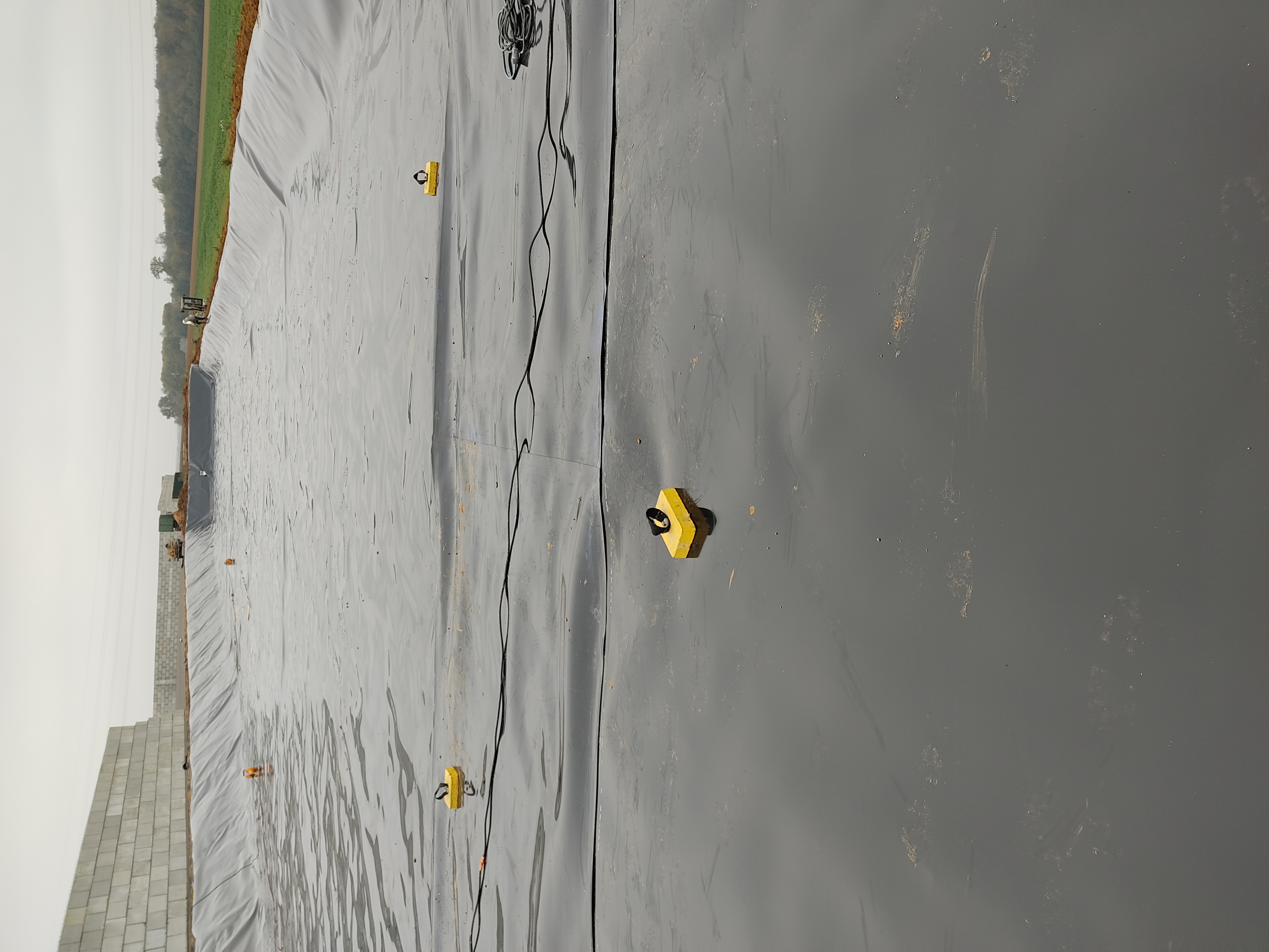 BASSIN DE RECUPERATION DES EAUX D'UNE PLATE FORME DE DECHETS   DPT60